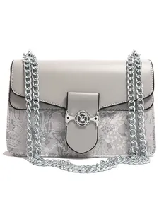Chic silver grey leather flap bag with floral embroidery and metallic chain strap