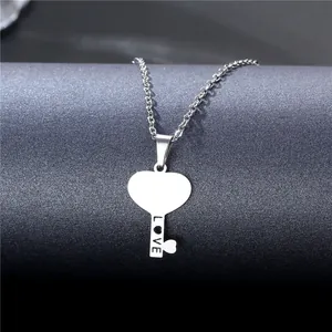 Polished silver stainless steel heart key pendant necklace with Love engraving on curb chain