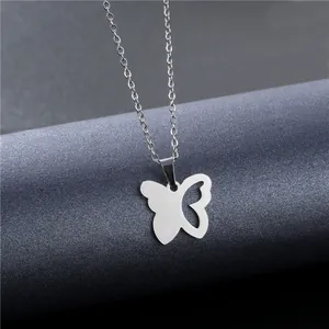 Minimalist silver butterfly pendant necklace with hollow wing on polished O-chain link