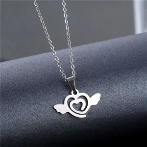Minimalist silver heart angel wing pendant necklace in polished stainless steel