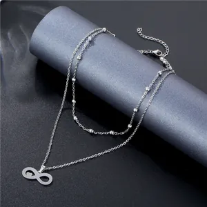 Bohemian silver double layer infinity pendant necklace on display stand