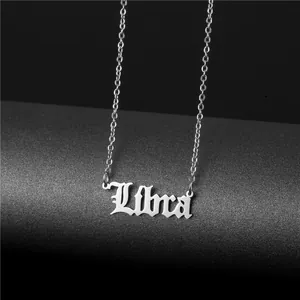 Silver Libra zodiac necklace with gothic hollow lettering on a refined box chain link