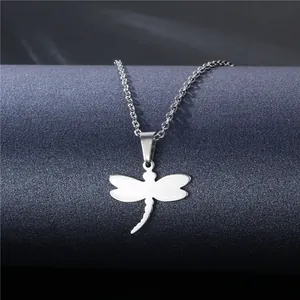 Polished stainless steel dragonfly pendant necklace with a fine silver cross chain