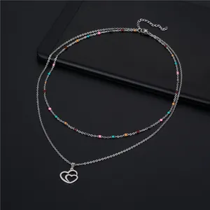 Double-layered stainless steel necklace featuring colorful beads and hollow heart pendants