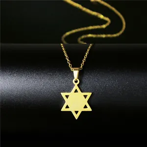 Macro detail of 18K gold plated stainless steel hexagram star pendant necklace