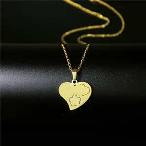 Polished 18K gold-plated stainless steel heart pendant necklace with floral cutout detail