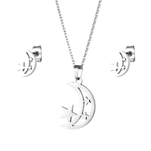 Detailed view of stainless steel hollow moon and stars necklace and earrings set