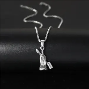 Halskette aus Edelstahl mit kreativen Zahnpasta- und Zahnbürsten-Anhängern in Silber