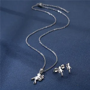 Detailed view of silver fairy pendant necklace and matching stud earrings jewelry set