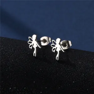 Detailed macro view of silver fairy silhouette stud earrings on a dark display stand