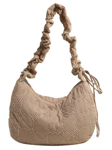 Chic beige quilted padded shoulder bag with scrunchie strap and dumpling shape design