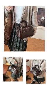 Deep brown glossy Boston bag with dual handles and shoulder strap in various styles