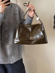 Olive green glossy leather tote bag with chain strap and large capacity design