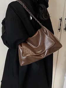 Fashionable brown leather tote bag with chain strap for women, casual autumn shoulder bag
