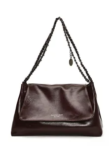 Fashionable dark brown leather tote bag with woven chain strap on white background