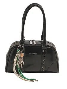 Glossy black underarm Boston bag with silver zipper and sparkling bear charm detail