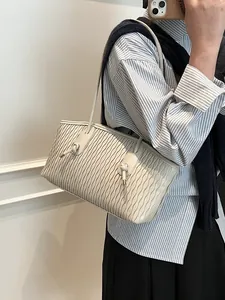 Fashionable cream white shoulder bag with wave texture for women's stylish daily use