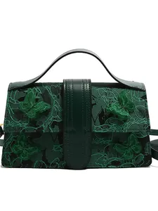 Dark green square tote bag with 3D butterfly embroidery and leather buckle flap detail