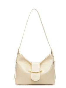 Minimalist cream white leather bucket bag with gold crescent metal detail on white background