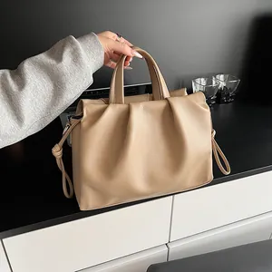 Elegant khaki pleated cloud bag for women with leather texture and shoulder strap