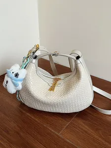 Women Woven Hobo Bag Vintage Half Moon Shoulder Bag Luxury PU Leather Crossbody Bag With Cute Plush Charm For Daily Commute