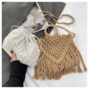 Detailed close-up of bohemian woven bag featuring inner drawstring pouch and wood handle