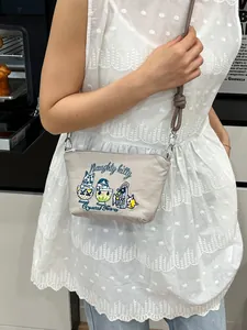 Japanese style embroidery crossbody bag with cute naughty kitty cartoon for women