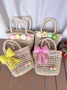 Floral woven handbags with satin bows and crochet flowers for beach and summer vacations