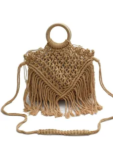 Bohemian macramé handbag with round wooden handles and long decorative fringes