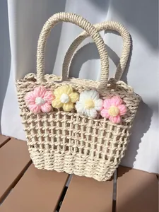 Floral crochet woven straw handbag in cream white for beach vacations and summer style