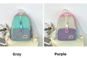 Detail of colorful contrast stitching nylon backpacks with TOCHASO mountain logo patch