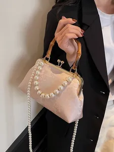 Rosa Jacquard Handtasche mit Bambusgriff und Perlenkette für traditionelle Qipao Mode