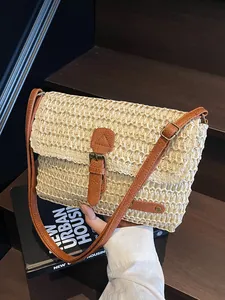 Handgeweven stro crossbody tas in beige met bruine imitatielederen riem voor het strand