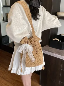 Borsa a spalla intrecciata con fiocco in pizzo, perfetta per le vacanze al mare