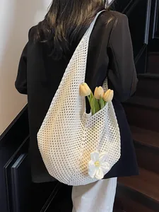Chic beige hollow-out crochet beach tote bag with floral accents and large capacity