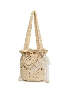 Borsa a secchiello da spiaggia in pizzo con fiocco e perle per le vacanze estive da donna