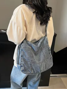 Retro denim crossbody bag with patchwork design and contrast stitching for women
