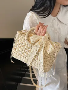 Stroh-Handtasche mit Spitzenschleife und Kordelzug-Futter für Strandurlaube