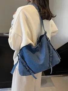 Retro large denim hobo bag in dark blue with adjustable metal buckles for daily wear