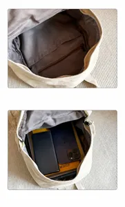 Detailweergave van de canvas rugzak binnenzijde voor telefoon, tablet en accessoires