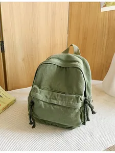 Retro olijfgroene canvas mini rugzak met gevlochten touw ritsen en een voorvak