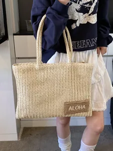 Grande borsa tote in paglia intrecciata beige con ricamo ALOHA e manici lunghi