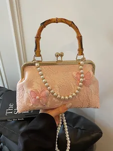 Sweet pink floral embroidery shell bag with butterfly detail and bamboo handle