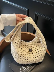 Chic beige crochet knit tote bag with hollow out design and wooden button for beach vacation