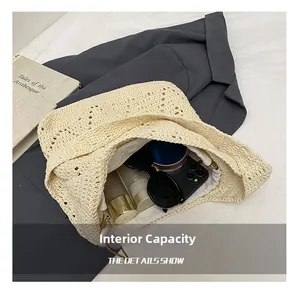Interior capacity of the hollow crochet tote bag with drawstring closure and daily items
