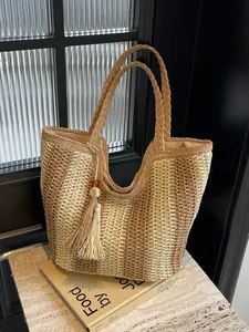 Handwoven summer straw tote bag with bohemian tassel and durable round handles