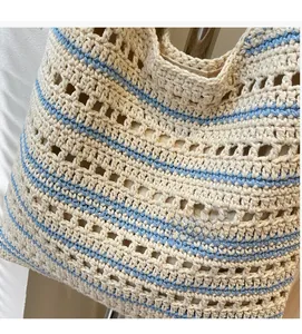 Close-up of hand-woven striped crochet pattern with hollow design and inner lining