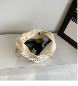 Spacious interior of beige striped crochet tote bag showing large capacity for essentials