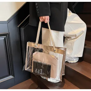 Detail of transparent PVC beach tote bag with rope handles and inner pouch on stairs