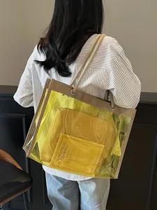 Beach tote bag with yellow transparent PVC shell, inner pouch and rope shoulder strap